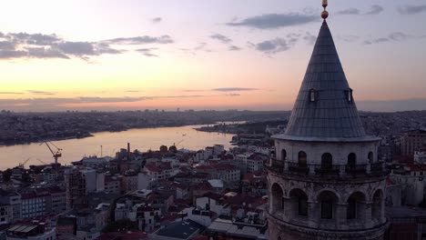 Aerial-passes-by-Galata-Tower-during-Sunset