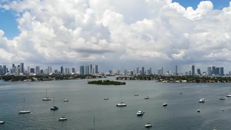 Time-Lapse-of-Boats-and-Yachts-in-Harbor-with-Miami-Skyline,-Copy-Space