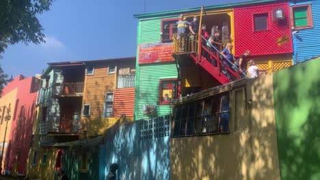 turists-visiting--street-museum-of-colourful-painted-houses