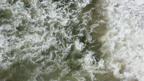 Overhead-Shot-Of-Beautiful-Waves-Crashing-On-Sandy-Beach,-California