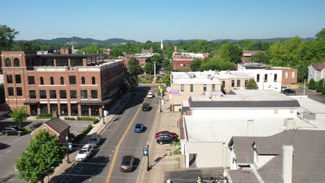 Downtown-Franklin,-Tennessee-with-drone-video-moving-forward-past-clock-tower