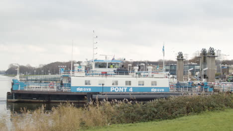 Wide-shot-of-Amsterdam-Ferry-docking