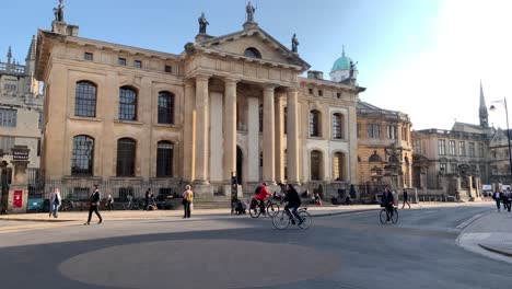 A-view-of-cyclists-and-pedestrians-on-Broad-Street-in-front-of-the-Clarendon-Building-in-Oxford,-England