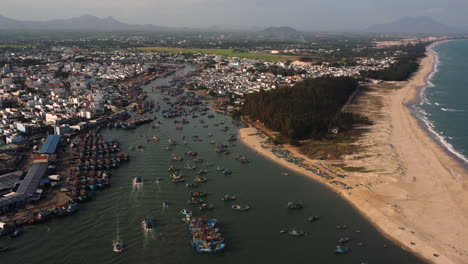 Aerial-view-on-fishing-harbour-on-Song-Dinh-river-in-La-Gi,-Vietnam