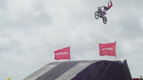 The-Royal-Cornwall-Show-Bolddog-FMX-Freestyle-Riders-Jumping-Over-a-Ramp-Pulling-Stunts-in-the-Air