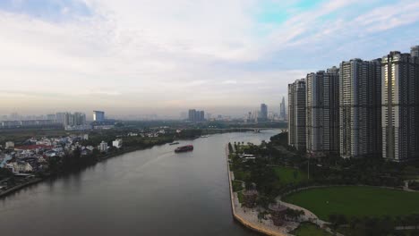 Aerial-view-of-Saigon-River-And-Downtown-Of-District-1,-Ho-Chi-Minh-City