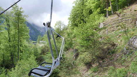 Chair-lift-or-ski-lift-in-Planica,-Slovenia-in-the-summer-with-nature-in-the-background