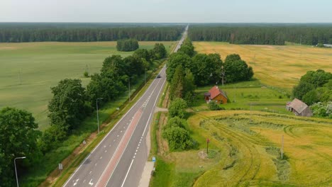 Aerial-view-rural-asphalt-road-with-a-beautiful-landscape