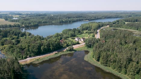 Mazury-Region-in-Poland---Drone-flight-aerial-bird-flyover-the-historical-region-in-northern-and-northeastern-Poland,-famous-for-its-2,000-lakes,-part-of-the-Warmian-Masurian-Voivodeship
