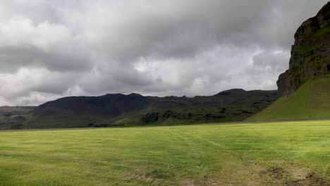 Mountains-in-Iceland-and-field-with-video-panning-left-to-right