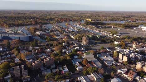 Aerial-view-of-Tigre-Village-and-river-in-background-during-sunset-time---Panoramic-view