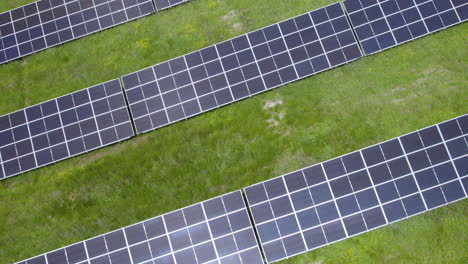 Flying-Over-Solar-Cell-Panels-In-Summer