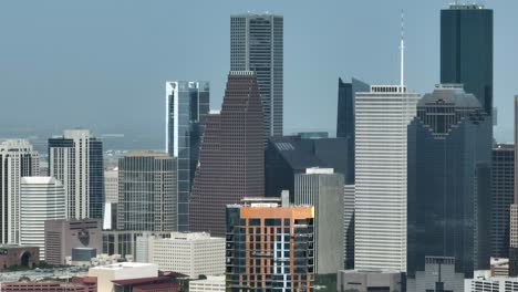 Downtown-Texas-city-skyline.-Aerial-pan,-long-zoom