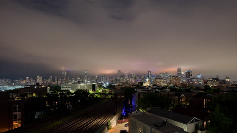 Sweeping-low-clouds-over-the-Chicago-skyline-on-a-summer-storm-filled-night---Full-wide-view