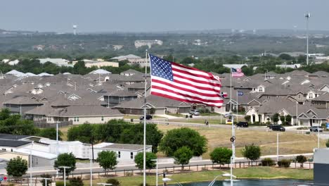 Establishing-aerial-shot-of-large-American-flag-waving