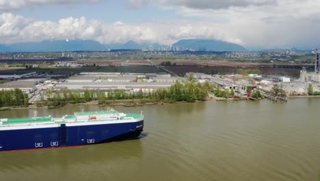 Large-Car-Carrier-Ship-Navigating-On-Fraser-River-In-Vancouver,-British-Columbia,-Canada
