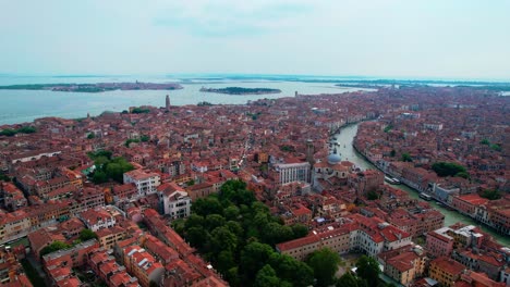 Aerial-View-Over-Orange-Rooftop-Buildings-In-Venice