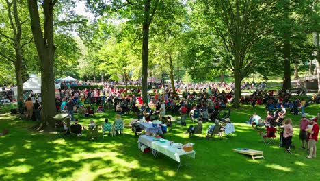 Beautiful-outdoor-park-with-large-crowd-of-people-relaxing-in-USA