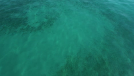 Turquoise-Ocean-Revealed-Jetty-Near-Kusadasi-Resort-Town-In-Turkey