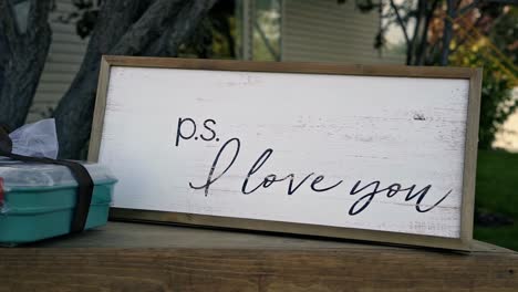 A-wooden-sign-that-reads-"p