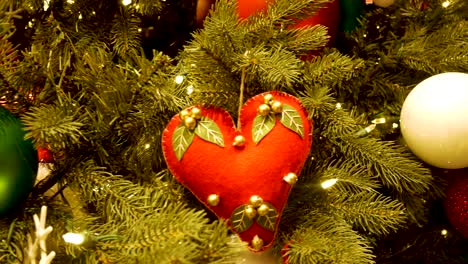 Beautifully-decorated-Christmas-tree---close-up-of-a-slow,-sliding-shot