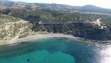 Aerial-pull-back-and-push-in-on-a-running-path-on-the-coast-of-Akamas-in-Cyprus-Paphos