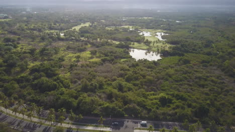Aerial-of-sunny,-tropical-golf-course-in-Mexico