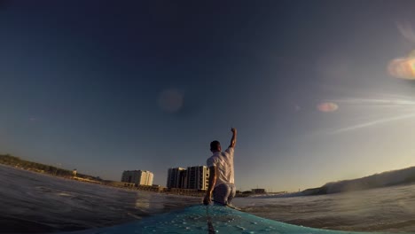Surfing-at-the-sunset.-Gopro