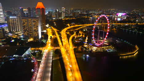 Singapur---Alrededor-De-Lapso-De-Tiempo-En-Movimiento-Del-Hermoso-Horizonte-De-La-Ciudad-De-Singapur-En-La-Noche