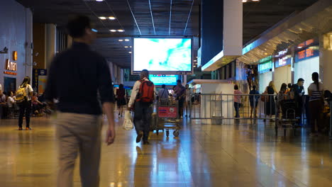 Bangkok-Thailand---Circa-Don-muang-airport-A-time-lapse-of-a-busy-airport-hallway-in-Bangkok,-Thailand