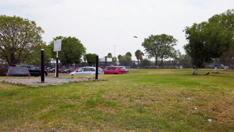 Parking-lot-of-an-industrial-park-with-big-areas-of-green-grass-A