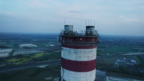 Aerial-view-on-the-top-of-a-chimney,-camera-moving-upwards