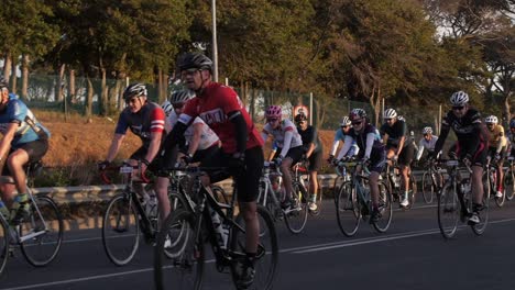 Cyclists-bunched-up-in-the-morning-light-during-the-Cape-Town-Cycle-Tour-SLOW-MOTION