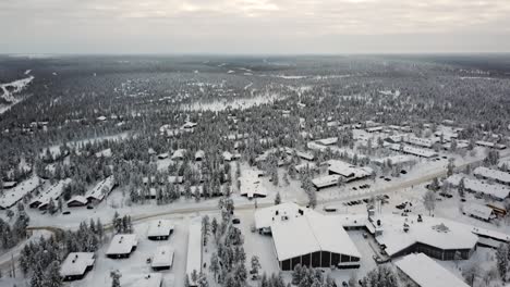 Drone-view-of-a-hotel-in-Saariselka,-Lapland,-Finland