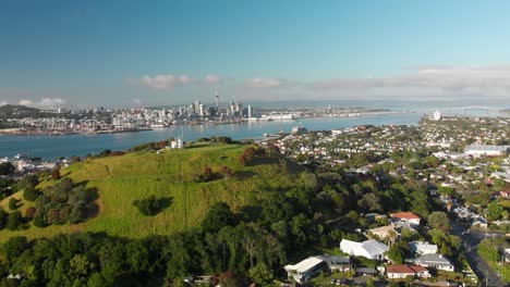 Aerial-shot-of-Auckland-Sky-Tower-and-skyline,-New-Zealand
