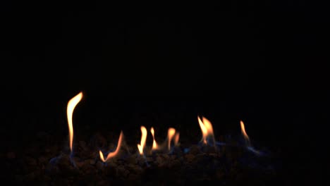 Different-angles-of-artificial-fire-burning-giving-a-modern,-rusty,-ambiental-vibe
