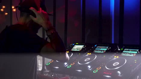 DJ-playing-in-a-club
