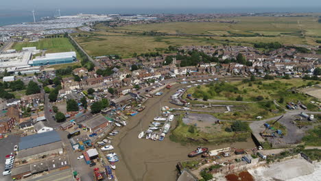 Wide-aerial-pullback-revealing-Queenborough-and-Sheerness-town---Docks-on-the-Isle-Of-Sheppey,-Kent,-UK