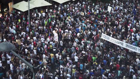 Big-crowd-of-people-at-demonstration,-aerial-shot-from-above