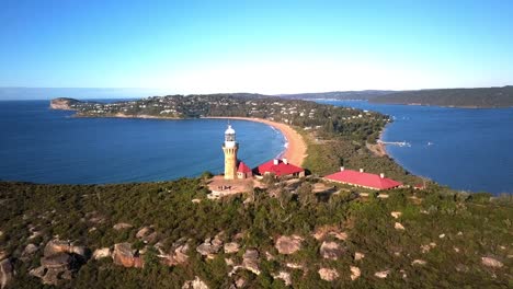 Aerial-shot-of-Barrenjoey-Lighthouse-at-Barrenjoey-Headland,-Palm-Beach,-Northern-Beaches-of-Sydney-Australia
