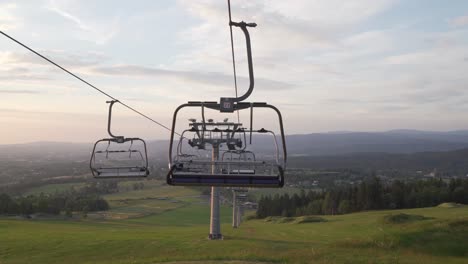 Summer-panorama-with-empty-ski-lift,-panning-left