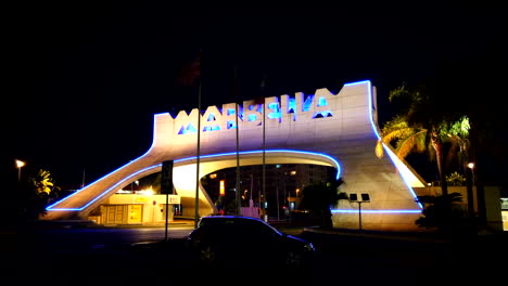 marbella-arch-sign-at-night-motion-hyperlapse-with-light-streaks-from-cars