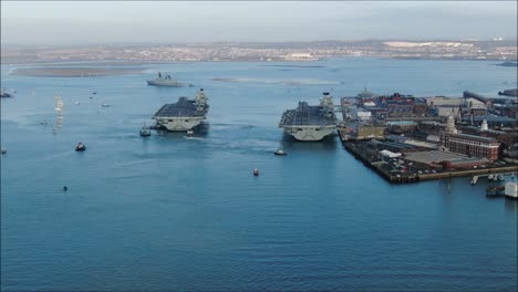 HMS-Queen-Elizabeth-pulls-alongside-the-docked-HMS-Prince-of-Wales