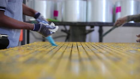 Paint-Brush-on-Industrial-Work-By-Workers---Industrial-Stock-Footage---Stock-footage