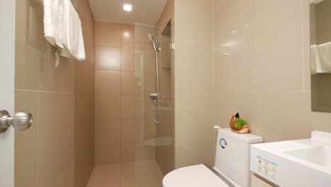 Small-White-Bathroom-in-an-Apartment--Hotel-Room