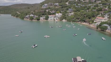 Aerial:-Expensive-waterfront-homes-near-East-Head-Knysna,-South-Africa