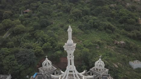 Close-Up-Aerial-Drone-Footage-of-the-Statue-of-Mariya-Apparition,-Nalgonda,-Telagana
