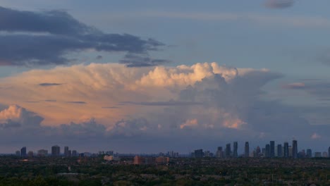 Sunset-time-lapse-of-large-cumulus-clouds-moving-above-Mississauga-skyline