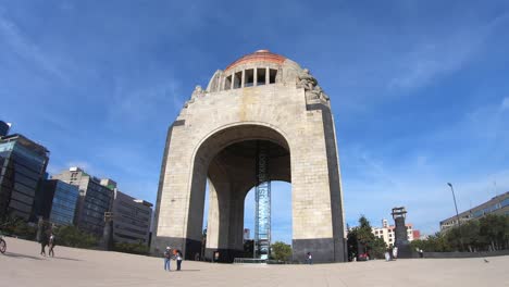 A-hyperlapse-walking-around-the-Monument-to-the-Revolution-in-Mexico-City,-Mexico,-one-of-the-major-landmarks-of-the-city