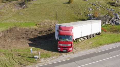 Aerial-View-Of-Large-Lorry-With-Container-Parked-By-The-Roadside
